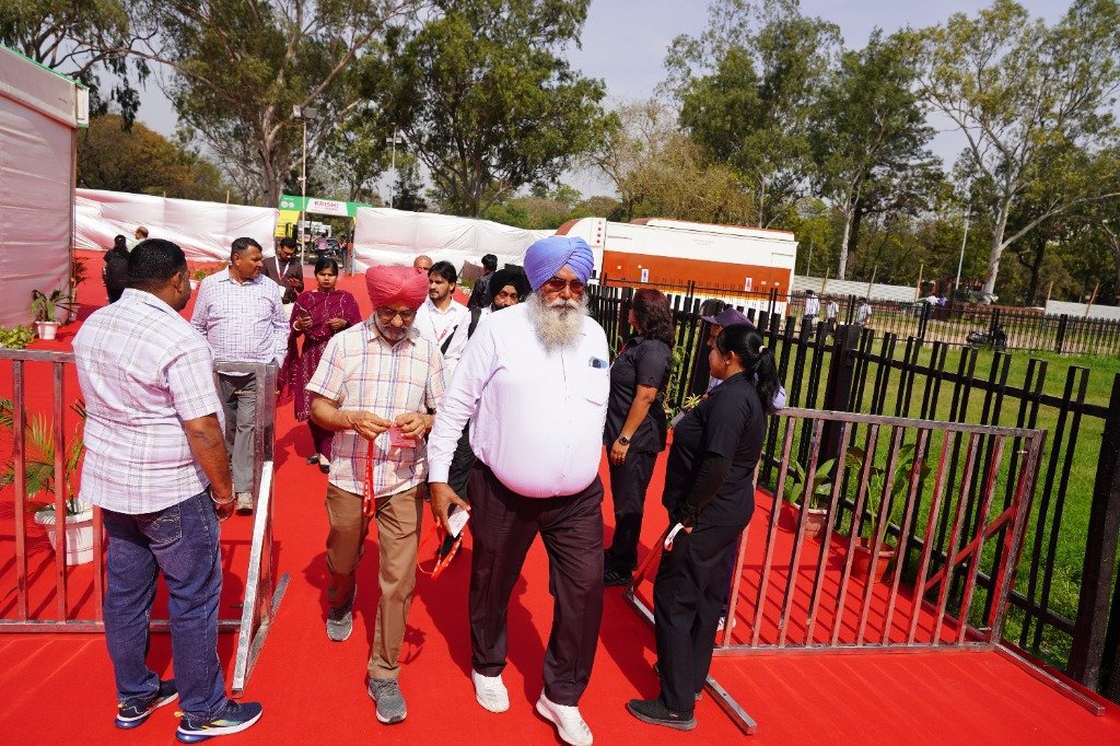 Dignitaries Walking Exhibition Hall